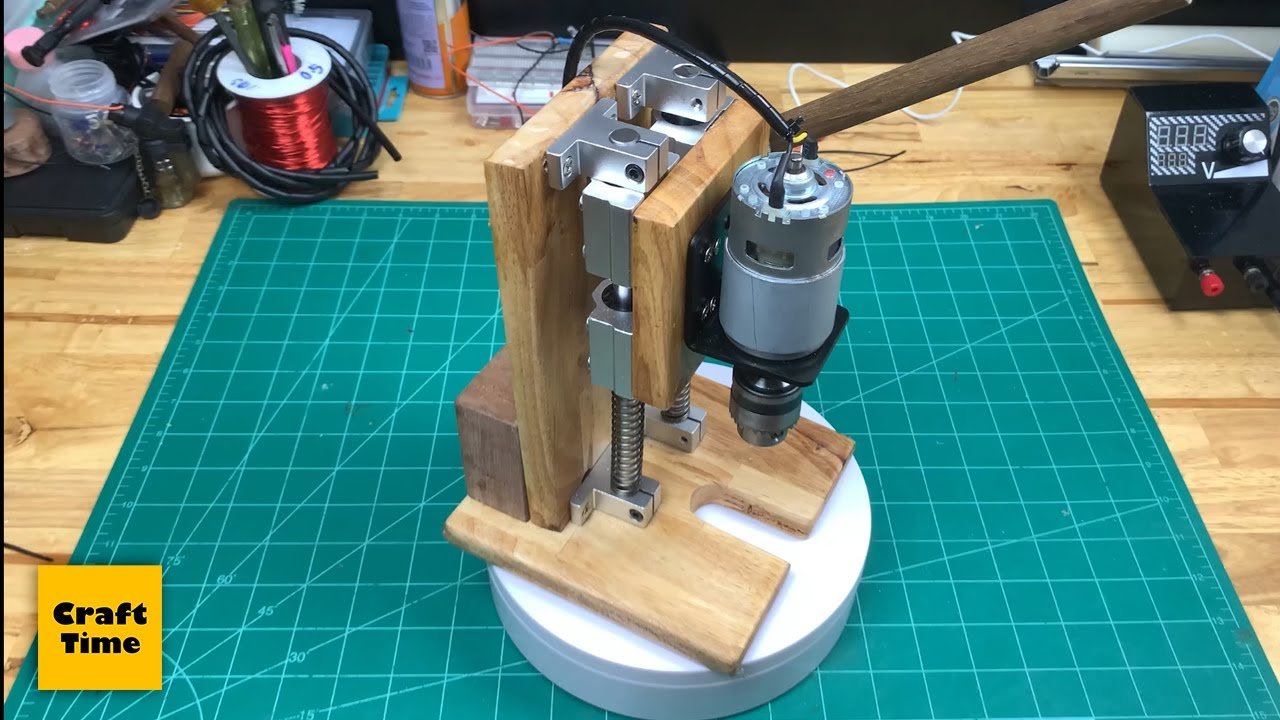 This video shows the process of making a Mini Drill Press Machine by Motor 775 DC 12 Volt.Thank you for wacthing.by Craft Time.